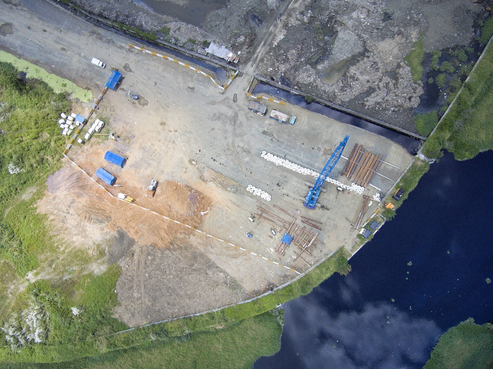 Commercial drone surveying a construction site